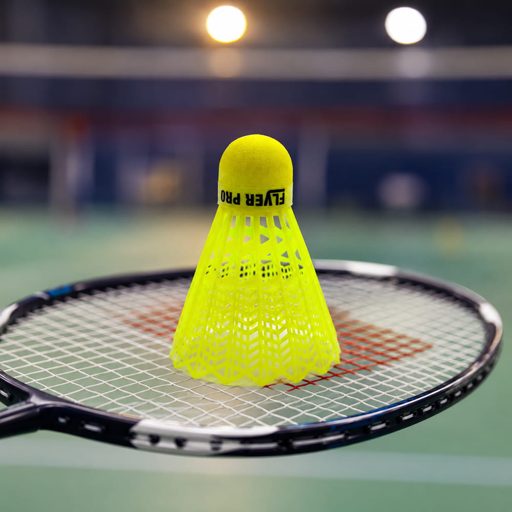 Volt Pro Flyer Pro Plastic Shuttlecock Pack of 10 is designed for badminton practice, training, and recreational play. Featuring a durable plastic skirt and neon cork base, these shuttlecocks provide accurate flight, stable performance, and enhanced visibility during gameplay.