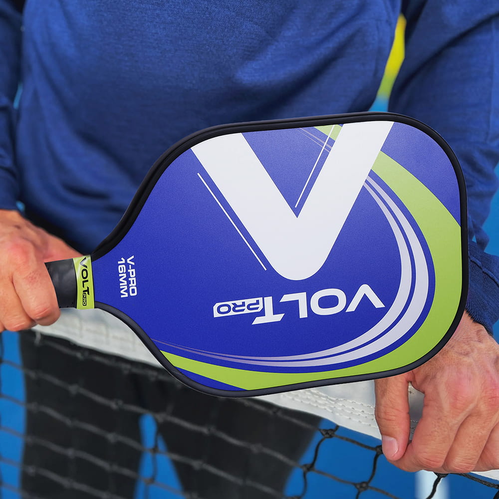 Volt Pro 1 Paddle + 2 Balls Set carbon fibre gritty spin tech, 16mm core. Includes 1 indoor 26-hole ball, 1 outdoor 40-hole ball, premium carry bag.