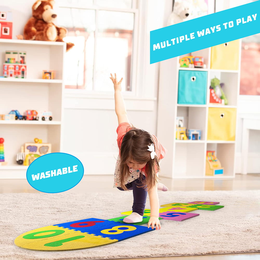 Play Eva Stapu Hopscotch Mat is a fun EVA foam floor game designed to encourage active play and physical activity. Featuring 11 interlocking tiles, a large 84 x 24 inch play area, and an anti-skid 3D embossed surface, it is ideal for indoor and outdoor use.